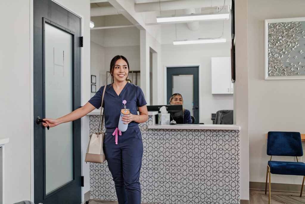 Healthcare professional smiling in office