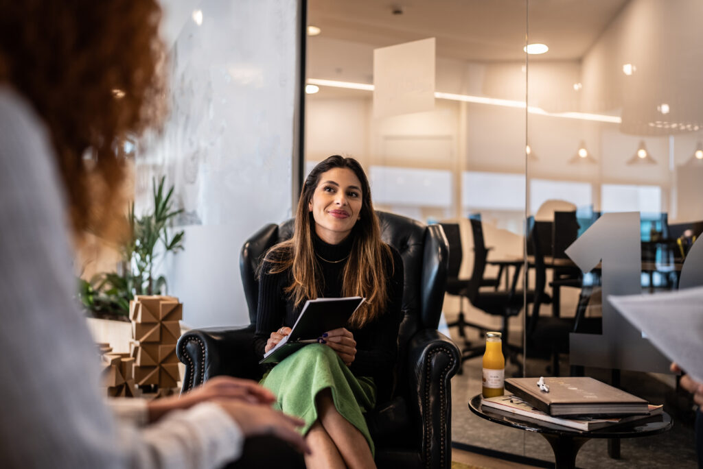 Young person in a meeting with coworkers at the office