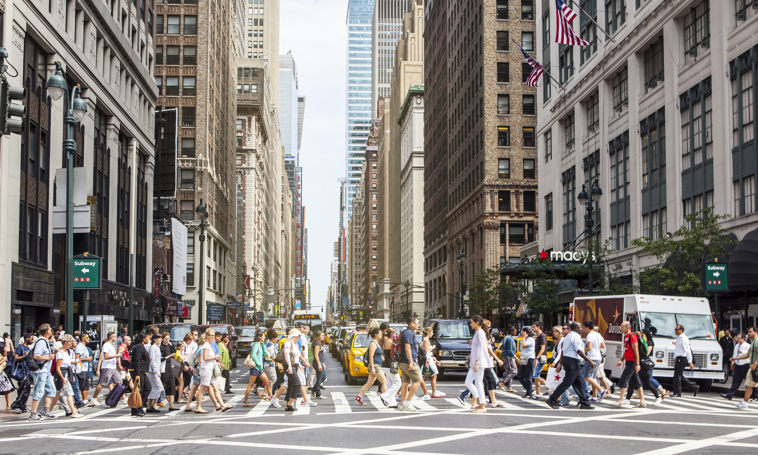 Pedestrians on zebra crossing, New York City, USA