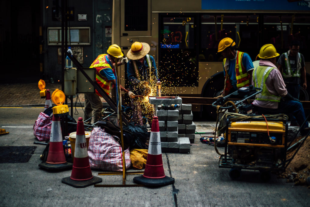 Construction workers doing road repairs