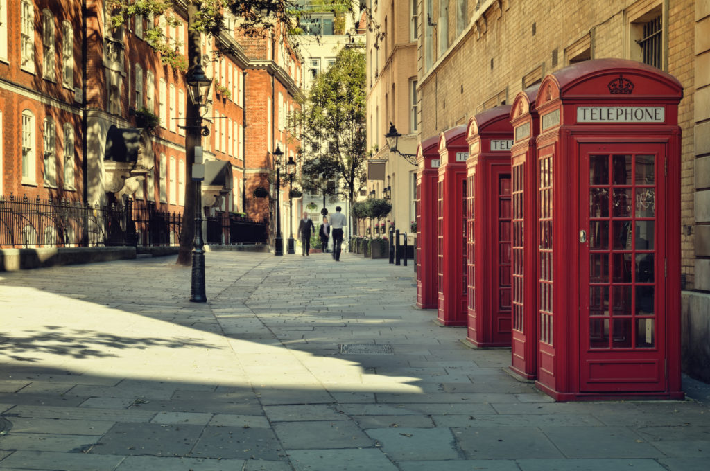 London street with traditional red telephone boxes