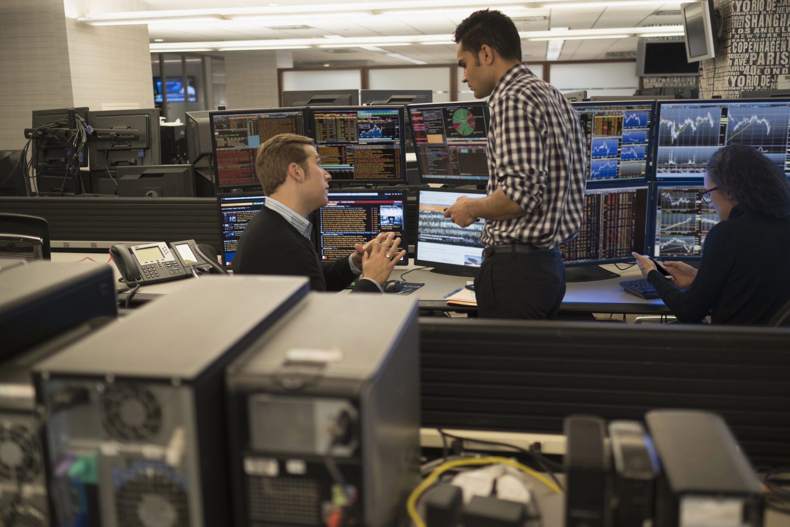 Young traders working in stock market