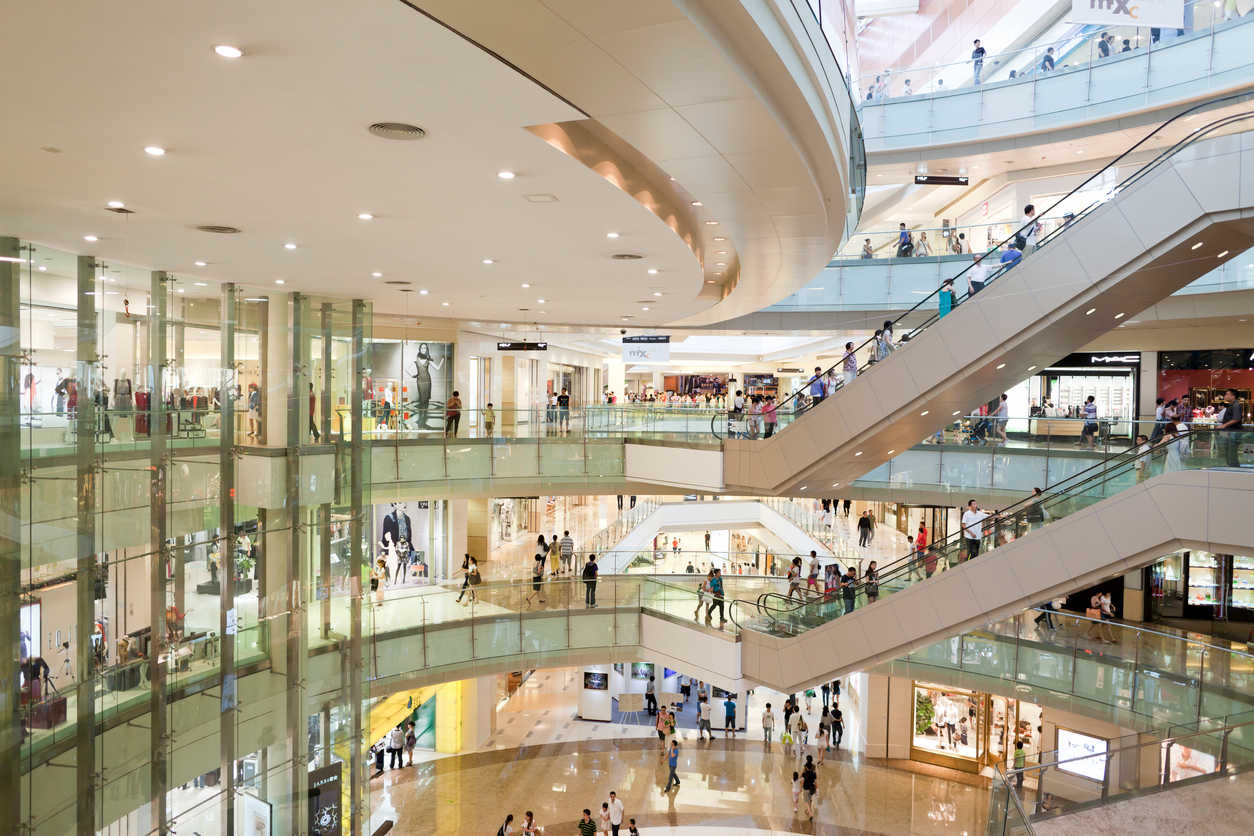 The interior of a multi-level shopping mall.