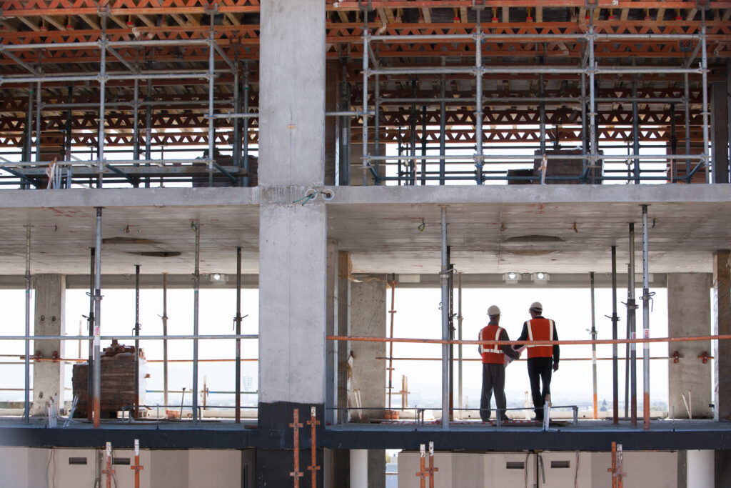 Construction workers standing together on construction site