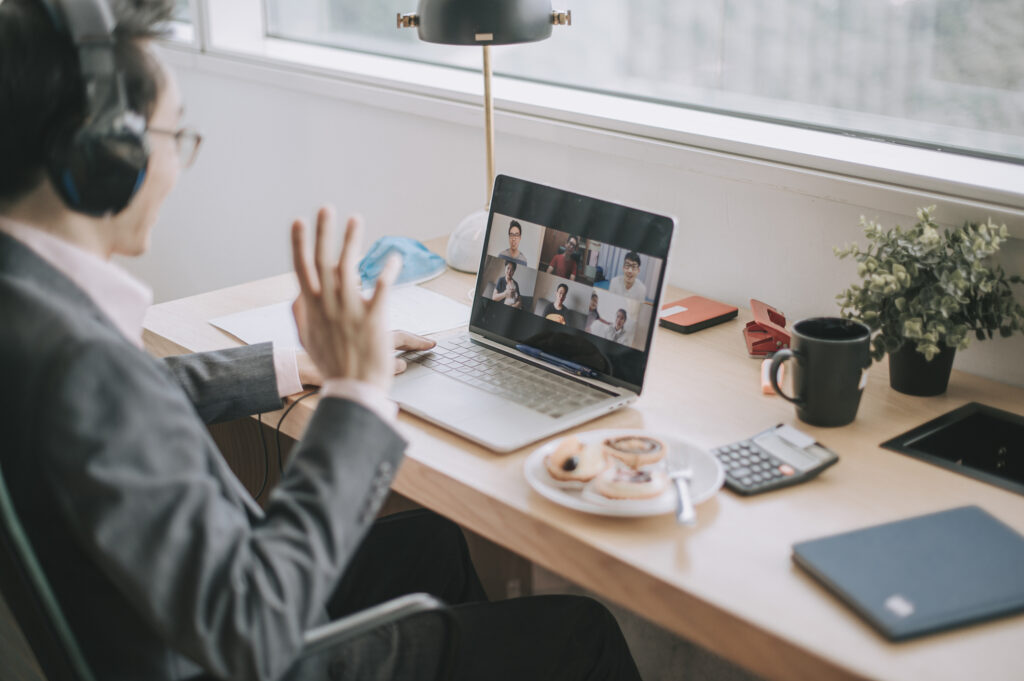 Person having a video conference at their desk